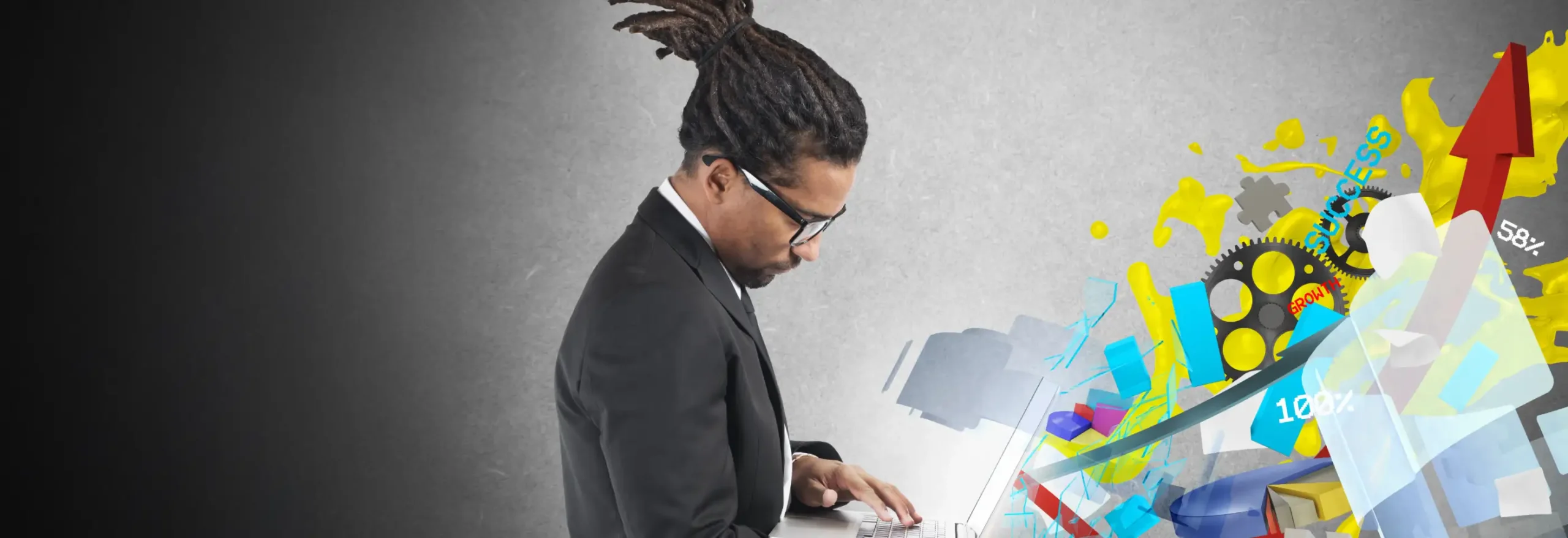 Man in black suit and glasses working on laptop with colorful 3D business graphics and upward red arrow